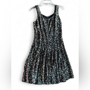 Carole Little Black Dress with Gold Swirl Design